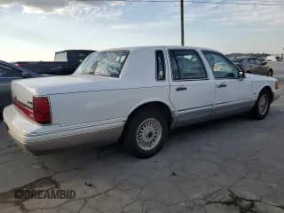 ✅ 1992 Lincoln Town Car Signature • VIN: 1LNLM82W1NY760850 • Lot: 74560254. Listed on Copart with 161,819 mi. Free auction sales archive from the USA and detailed vehicle history report at DreamBid. Image 3.
