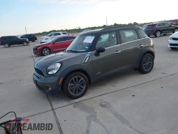 ✅ 2014 MINI Countryman S • VIN: WMWZC5C58EWM17886 • Lot: 43170727. Listed on IAAI with 114,582 mi. Free auction sales archive from the USA and detailed vehicle history report at DreamBid. Image 2.