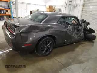 2023 Dodge Challenger SXT с VIN 2C3CDZGG5PH663048, выставлен на аукционе Copart как лот 84412265 с пробегом 57 540 миль миль и Чистый • Clean title. История ставок и продаж доступна на DreamBid. Изображение 3.