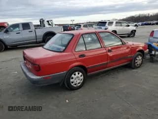 ✅ 1993 Nissan Sentra E • VIN: JN1EB31P9PU214164 • Лот: 85565354. Опубликован ранее на Copart с пробегом 317 890 миль. Бесплатный доступ к архиву аукционных продаж из США и подробный отчёт об истории автомобиля на DreamBid. Изображение 3.