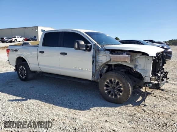 ✅ 2016 Nissan Titan Platinum Reserve • VIN: 1N6BA1F49GN517099 • Lot: 82692335. Listed on Copart with 107,942 mi. Free auction sales archive from the USA and detailed vehicle history report at DreamBid. Image 4.