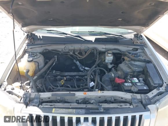 ✅ 2010 Mercury Mariner Premier • VIN: 4M2CN8H72AKJ00244 • Lot: 42502315. Listed on IAAI with 134,214 mi. Free auction sales archive from the USA and detailed vehicle history report at DreamBid. Image 10.
