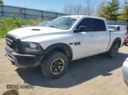 ✅ 2017 Ram 1500 Rebel • VIN: 1C6RR7YT7HS858318 • Lot: 56338085. Listed on Copart with 143,301 mi. Free auction sales archive from the USA and detailed vehicle history report at DreamBid. Image 1.