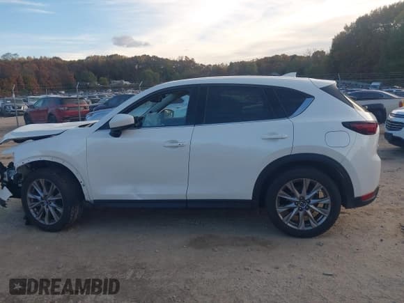 ✅ 2019 Mazda CX-5 Grand Touring • VIN: JM3KFBDM1K0650496 • Lot: 43483224. Listed on IAAI with 107,358 mi. Free auction sales archive from the USA and detailed vehicle history report at DreamBid. Image 14.