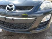 ✅ 2012 Mazda CX-7 i Touring • VIN: JM3ER2CM5C0415574 • Lot: 42263702. Wystawiony na IAAI z przebiegiem 293 566 mil. Bezpłatny archiwum sprzedaży aukcyjnych z USA i szczegółowy raport historii pojazdu na DreamBid. Zdjęcie 21.