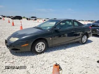 ✅ 2001 Saturn SC • VIN: 1G8ZN12881Z200956 • Лот: 58167855. Опубликован ранее на Copart с пробегом 82 307 миль. Бесплатный доступ к архиву аукционных продаж из США и подробный отчёт об истории автомобиля на DreamBid. Изображение 1.