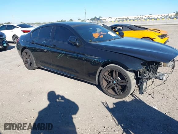 ✅ 2015 BMW 6 Series 640i xDrive • VIN: WBA6B8C55FD453166 • Lot: 41296865. Wystawiony na IAAI z przebiegiem 103 816 mil. Bezpłatny archiwum sprzedaży aukcyjnych z USA i szczegółowy raport historii pojazdu na DreamBid. Zdjęcie 19.