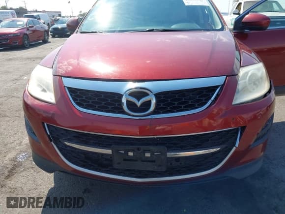 ✅ 2012 Mazda CX-9 Touring • VIN: JM3TB2CA8C0349720 • Lot: 43133917. Listed on IAAI with 192,197 mi. Free auction sales archive from the USA and detailed vehicle history report at DreamBid. Image 6.