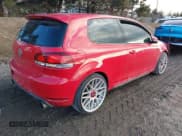 ✅ 2012 Volkswagen Golf GTI w/Conv & Sunroof • VIN: WVWEV7AJ9CW292286 • Lot: 41478359. Listed on IAAI with 153,000 mi. Free auction sales archive from the USA and detailed vehicle history report at DreamBid. Image 4.