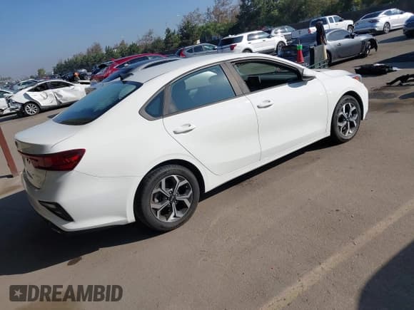 ✅ 2019 Kia Forte LXS • VIN: 3KPF24ADXKE067051 • Lot: 43535429. Listed on IAAI with 34,656 mi. Free auction sales archive from the USA and detailed vehicle history report at DreamBid. Image 4.