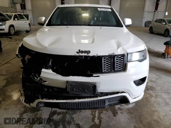 2018 Jeep Grand Cherokee Altitude z VIN 1C4RJFAG4JC397098, wystawiony jako Copart lot #82310585 z przebiegiem 138 914 mil mil oraz Szkoda całkowita • Salvage title. Historia ofert i sprzedaży dostępna na DreamBid. Obrazek 5.