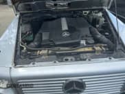 ✅ 2003 Mercedes-Benz G 500 • VIN: WDCYR49EX3X136883 • Lot: 85001665. Listed on Copart with 146,911 mi. Free auction sales archive from the USA and detailed vehicle history report at DreamBid. Image 7.