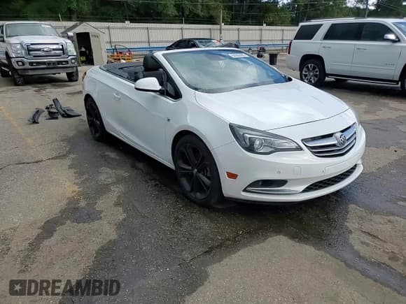 ✅ 2016 Buick Cascada Premium • VIN: W04WT3N52GG122345 • Lot: 84062985. Wystawiony na Copart z przebiegiem 103 646 mil. Bezpłatny archiwum sprzedaży aukcyjnych z USA i szczegółowy raport historii pojazdu na DreamBid. Zdjęcie 14.