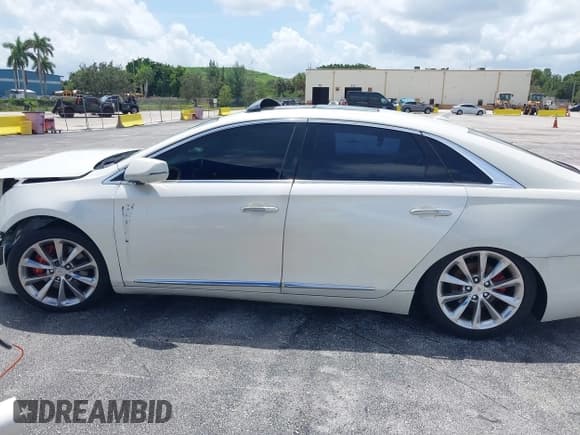 ✅ 2014 Cadillac XTS Luxury • VIN: 2G61M5S33E9326484 • Lot: 43119276. Listed on IAAI with 99,833 mi. Free auction sales archive from the USA and detailed vehicle history report at DreamBid. Image 14.
