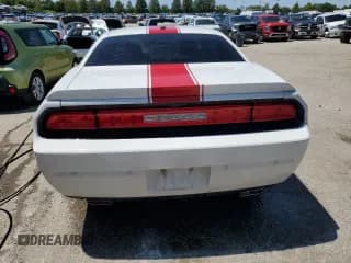 ✅ 2013 Dodge Challenger SXT • VIN: 2C3CDYAG4DH545023 • Lot: 65754724. Wystawiony na Copart z przebiegiem 214 753 mil. Bezpłatny archiwum sprzedaży aukcyjnych z USA i szczegółowy raport historii pojazdu na DreamBid. Zdjęcie 6.