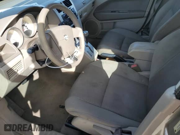 2009 Dodge Caliber SXT с VIN 1B3HB48A69D224902, выставлен на аукционе Copart как лот 63717534 с пробегом 132 736 миль миль и Списание • Salvage title. История ставок и продаж доступна на DreamBid. Изображение 7.