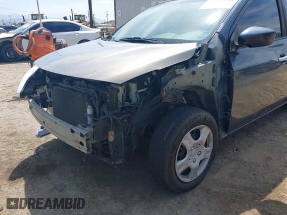 ✅ 2016 Nissan Versa SV • VIN: 3N1CN7AP4GL888447 • Lot: 43055694. Listed on IAAI with 115,815 mi. Free auction sales archive from the USA and detailed vehicle history report at DreamBid. Image 6.