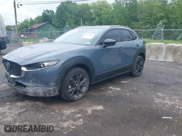 ✅ 2022 Mazda CX-30 S Carbon Edition • VIN: 3MVDMBCL8NM430370 • Lot: 42340348. Listed on IAAI with 79,513 mi. Free auction sales archive from the USA and detailed vehicle history report at DreamBid. Image 2.