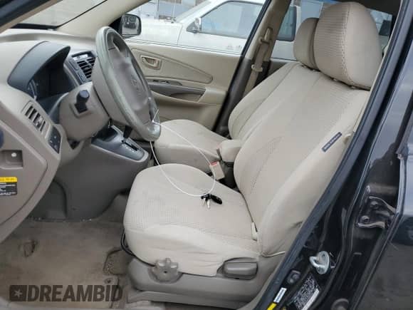 2009 Hyundai Tucson GLS z VIN KM8JM12B79U042549, wystawiony jako Copart lot #87487604 z przebiegiem 112 724 mil mil oraz Szkoda całkowita • Salvage title. Historia ofert i sprzedaży dostępna na DreamBid. Obrazek 7.