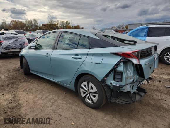 2018 Toyota Prius Two z VIN JTDKBRFU7J3058785, wystawiony jako Copart lot #90085795 z przebiegiem 83 292 mil mil oraz Szkoda całkowita • Salvage title. Historia ofert i sprzedaży dostępna na DreamBid. Obrazek 2.
