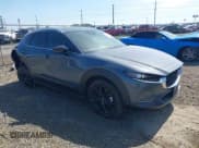 ✅ 2022 Mazda CX-30 S Carbon Edition • VIN: 3MVDMBCL8NM422737 • Lot: 42229336. Listed on IAAI with 14,665 mi. Free auction sales archive from the USA and detailed vehicle history report at DreamBid. Image 1.