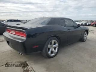 ✅ 2013 Dodge Challenger SXT • VIN: 2C3CDYAG3DH519691 • Lot: 84619804. Wystawiony na Copart z przebiegiem 169 199 mil. Bezpłatny archiwum sprzedaży aukcyjnych z USA i szczegółowy raport historii pojazdu na DreamBid. Zdjęcie 3.