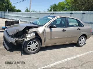 ✅ 2003 Ford Focus SE • VIN: 1FAFP34323W241979 • Lot: 59255185. Listed on Copart with 49,883 mi. Free auction sales archive from the USA and detailed vehicle history report at DreamBid. Image 1.