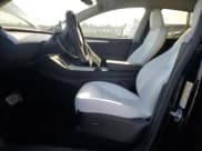 ✅ 2025 Tesla Model Y Performance • VIN: 7SAYGDEFXSF303183 • Lot: 82120175. Listed on Copart with 3,149 mi. Free auction sales archive from the USA and detailed vehicle history report at DreamBid. Image 7.