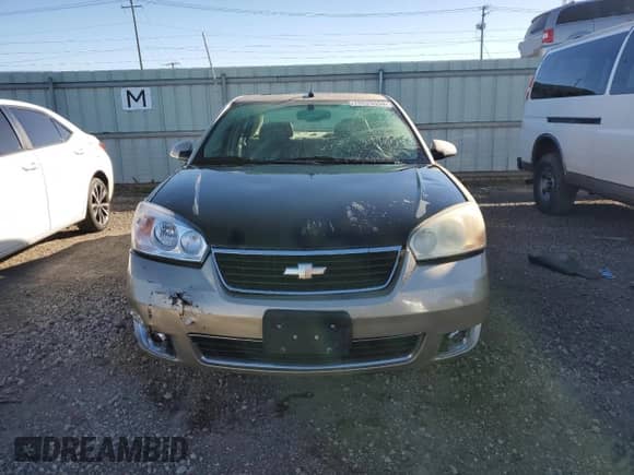 2006 Chevrolet Malibu LTZ with VIN 1G1ZU53816F243437, listed as a Copart auction lot 76529554 with 150,440 mi miles and Salvage title. Bid and sale history available at DreamBid. Image 5.
