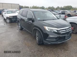 ✅ 2018 Honda Pilot Touring • VIN: 5FNYF5H99JB017044 • Lot: 43821143. Listed on IAAI with 156,739 mi. Free auction sales archive from the USA and detailed vehicle history report at DreamBid. Image 1.