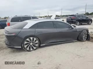 ✅ 2023 Lucid Air Grand Touring • VIN: 50EA1GBA8PA001431 • Lot: 75683014. Wystawiony na Copart z przebiegiem 12 117 mil. Bezpłatny archiwum sprzedaży aukcyjnych z USA i szczegółowy raport historii pojazdu na DreamBid. Zdjęcie 3.