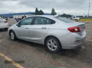 ✅ 2016 Chevrolet Cruze LT • VIN: 1G1BE5SM9G7297321 • Lot: 70029385. Wystawiony na Copart z przebiegiem 135 441 mil. Bezpłatny archiwum sprzedaży aukcyjnych z USA i szczegółowy raport historii pojazdu na DreamBid. Zdjęcie 2.