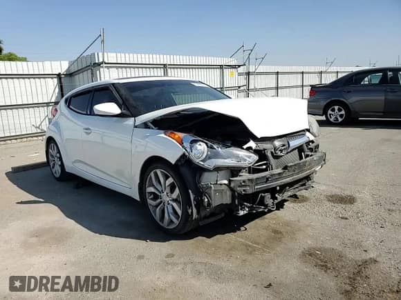 2013 Hyundai Veloster w/Black Int с VIN KMHTC6AD4DU147327, выставлен на аукционе Copart как лот 70406034 с пробегом 121 381 миль миль и Списание • Salvage title. История ставок и продаж доступна на DreamBid. Изображение 11.