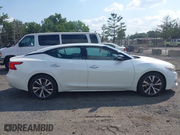 ✅ 2016 Nissan Maxima Platinum • VIN: 1N4AA6AP2GC392848 • Лот: 42793478. Опубликован ранее на IAAI с пробегом 98 728 миль. Бесплатный доступ к архиву аукционных продаж из США и подробный отчёт об истории автомобиля на DreamBid. Изображение 13.