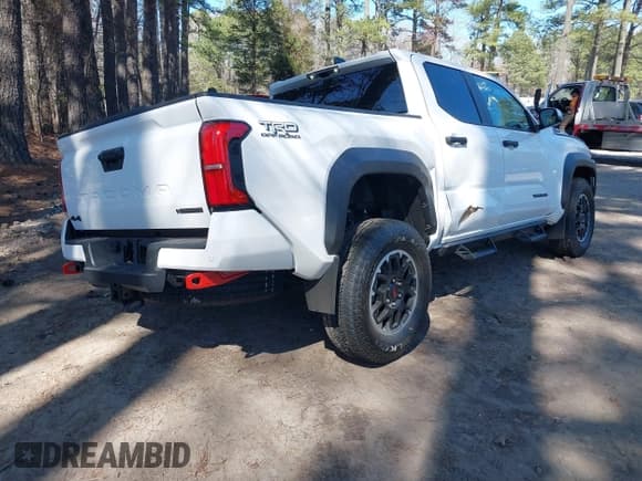 ✅ 2024 Toyota Tacoma TRD Sport Hybrid • VIN: 3TYLC5LN7RT015294 • Lot: 41886724. Listed on IAAI with 157 mi. Free auction sales archive from the USA and detailed vehicle history report at DreamBid. Image 4.