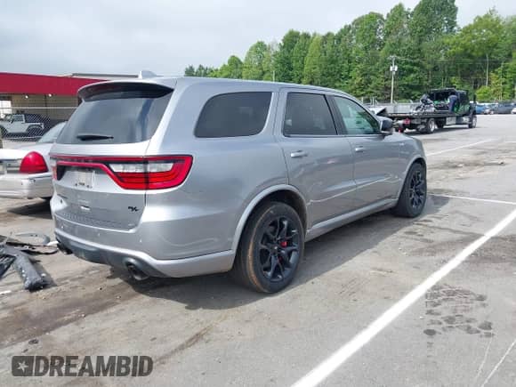 2021 Dodge Durango R/T with VIN 1C4SDJCT6MC879260, listed as a IAAI auction lot 42709837 with 59,646 mi miles and . Bid and sale history available at DreamBid. Image 4.