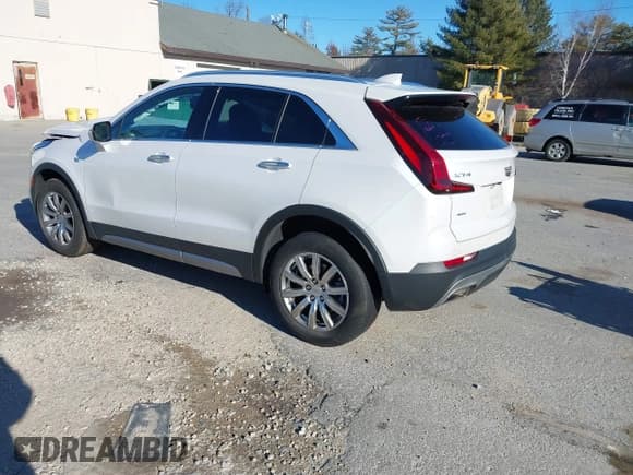 ✅ 2022 Cadillac XT4 AWD Premium Luxury • VIN: 1GYFZDR41NF105299 • Лот: 41257154. Опубликован ранее на IAAI с пробегом 34 904 миль. Бесплатный доступ к архиву аукционных продаж из США и подробный отчёт об истории автомобиля на DreamBid. Изображение 3.