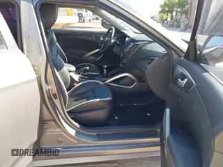 2014 Hyundai Veloster Turbo with VIN KMHTC6AE0EU184269, listed as a IAAI auction lot 43241844 with 60,668 mi miles and . Bid and sale history available at DreamBid. Image 5.