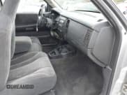 ✅ 2003 Dodge Dakota SLT • VIN: 1D7HL42X83S269082 • Lot: 41890813. Wystawiony na IAAI z przebiegiem Nie podano. Bezpłatny archiwum sprzedaży aukcyjnych z USA i szczegółowy raport historii pojazdu na DreamBid. Zdjęcie 5.