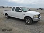 ✅ 1997 Ford F-150 • VIN: 2FTDX1765VCA44346 • Lot: 82113845. Listed on Copart with 218,765 mi. Free auction sales archive from the USA and detailed vehicle history report at DreamBid. Image 4.