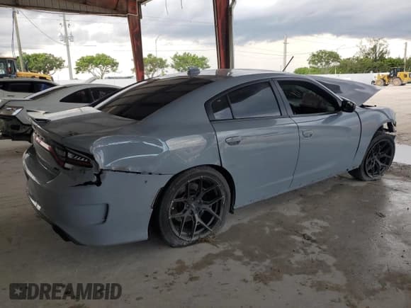 ✅ 2022 Dodge Charger GT • VIN: 2C3CDXHG2NH104248 • Lot: 70005275. Wystawiony na Copart z przebiegiem Nie podano. Bezpłatny archiwum sprzedaży aukcyjnych z USA i szczegółowy raport historii pojazdu na DreamBid. Zdjęcie 3.