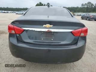 ✅ 2019 Chevrolet Impala LT • VIN: 2G11Z5S39K9121660 • Лот: 71054304. Опубликован ранее на Copart с пробегом 163 516 миль. Бесплатный доступ к архиву аукционных продаж из США и подробный отчёт об истории автомобиля на DreamBid. Изображение 6.