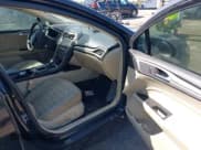 ✅ 2016 Ford Fusion SE • VIN: 3FA6P0H70GR308373 • Lot: 42036408. Listed on IAAI with 216,518 mi. Free auction sales archive from the USA and detailed vehicle history report at DreamBid. Image 5.