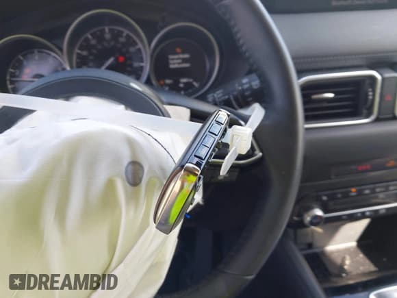 ✅ 2023 Mazda CX-5 S Carbon Edition • VIN: JM3KFBCM3P0271198 • Lot: 43280639. Listed on IAAI with 9,481 mi. Free auction sales archive from the USA and detailed vehicle history report at DreamBid. Image 11.