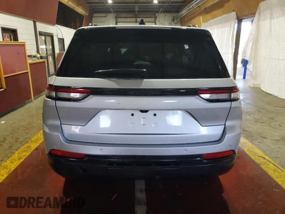 ✅ 2023 Jeep Grand Cherokee Altitude • VIN: 1C4RJGAGXPC580018 • Lot: 54586195. Listed on Copart with Not provided. Free auction sales archive from the USA and detailed vehicle history report at DreamBid. Image 6.