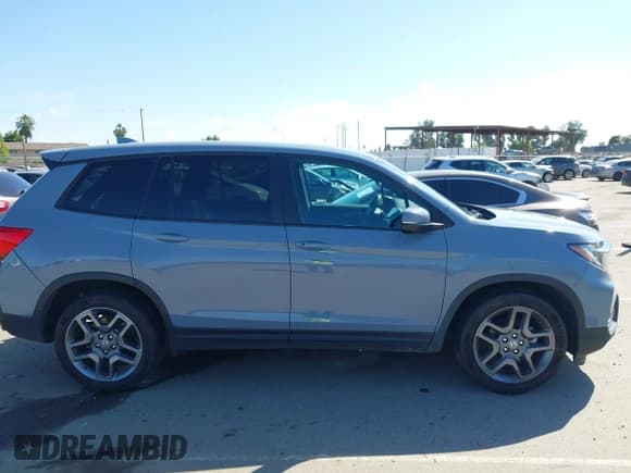 ✅ 2022 Honda Passport EX-L • VIN: 5FNYF7H52NB002772 • Lot: 42322827. Listed on IAAI with 55,798 mi. Free auction sales archive from the USA and detailed vehicle history report at DreamBid. Image 14.