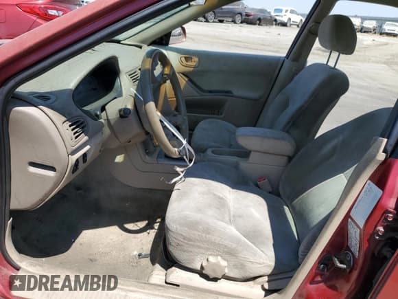 ✅ 2003 Mitsubishi Galant ES • VIN: 4A3AA46G33E068486 • Lot: 65167364. Wystawiony na Copart z przebiegiem 184 880 mil. Bezpłatny archiwum sprzedaży aukcyjnych z USA i szczegółowy raport historii pojazdu na DreamBid. Zdjęcie 7.