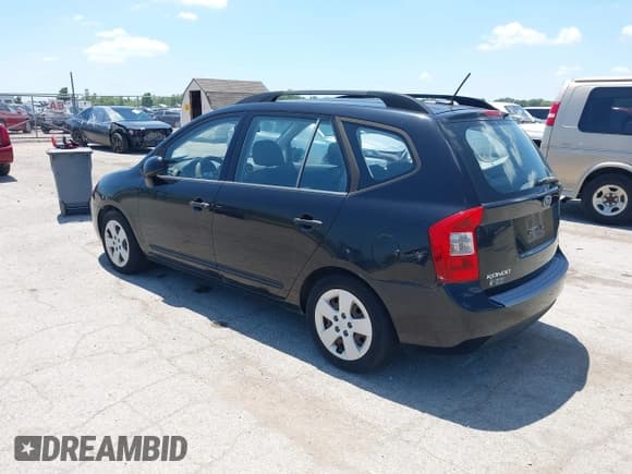 ✅ 2009 Kia Rondo LX • VIN: KNAFG528597278836 • Lot: 42662432. Listed on IAAI with 103,854 mi. Free auction sales archive from the USA and detailed vehicle history report at DreamBid. Image 3.