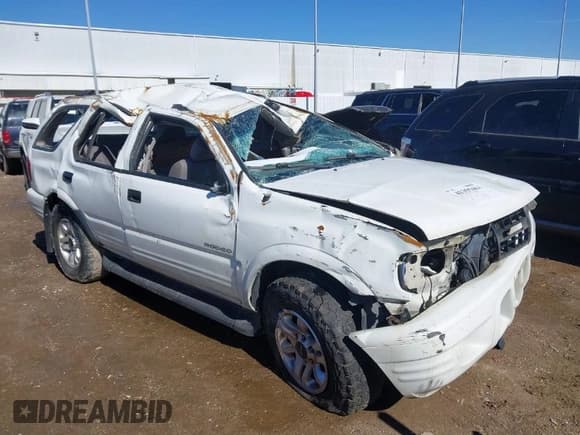✅ 2004 Isuzu Rodeo S • VIN: 4S2CK58W944315203 • Lot: 41355461. Listed on IAAI with Not provided. Free auction sales archive from the USA and detailed vehicle history report at DreamBid. Image 1.
