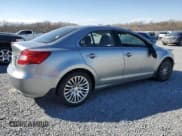 ✅ 2012 Suzuki Kizashi SE • VIN: JS2RF9A36C6100226 • Lot: 49574445. Listed on Copart with 160,071 mi. Free auction sales archive from the USA and detailed vehicle history report at DreamBid. Image 3.